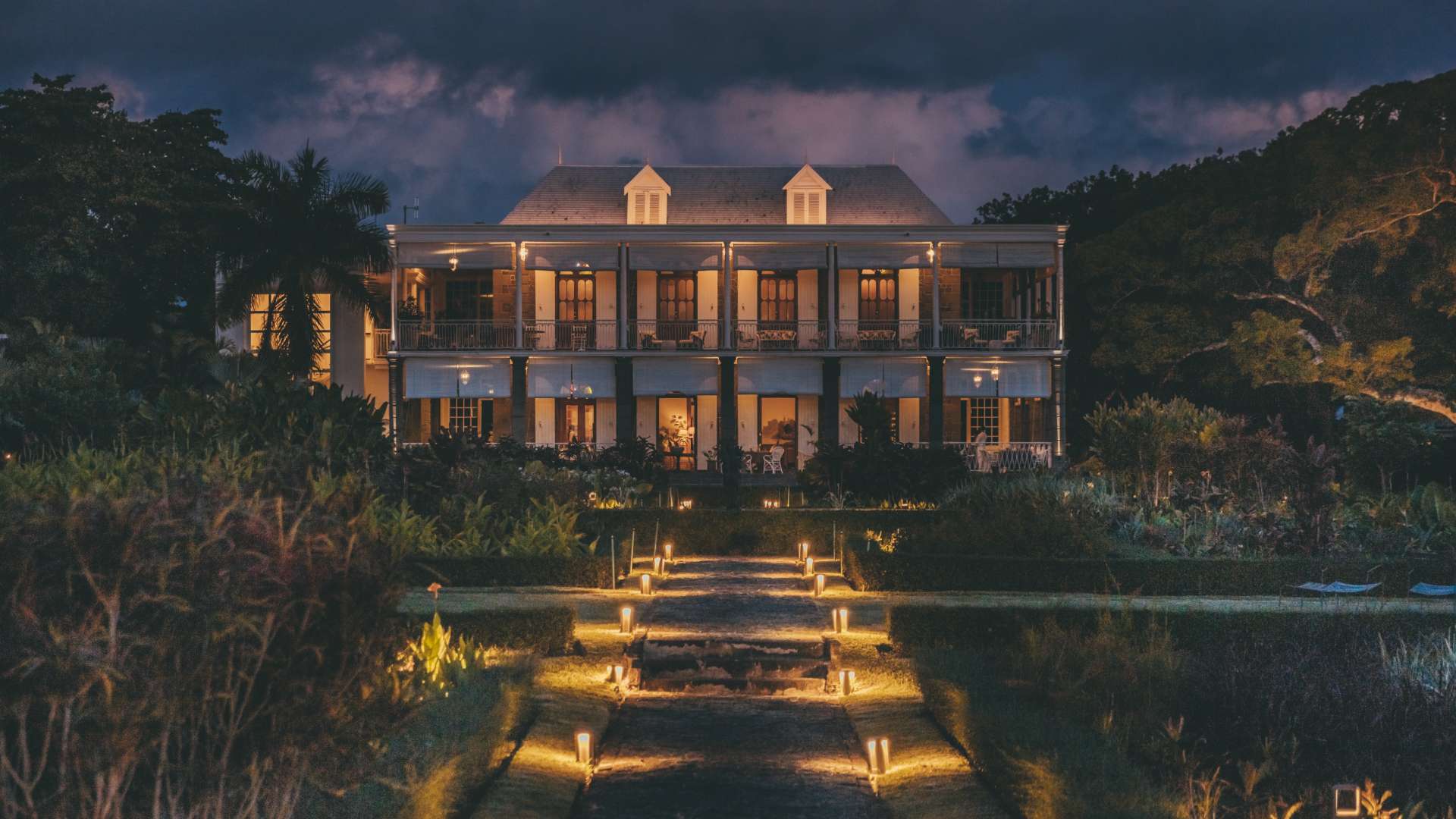 Bright view with Exterior Lights over Le Château de Bel Ombre at Night 