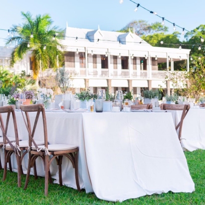 Exterior view of tables decorated for a wedding at Le Château de Bel Ombre