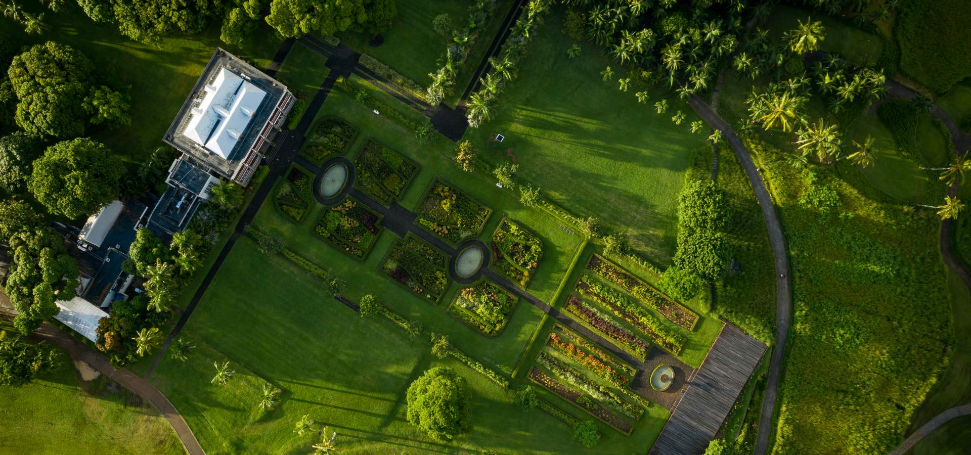 Top aerial view over Le Château de Bel Ombre